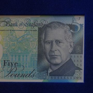 king charles iii is presented with first bank notes featuring his portrait