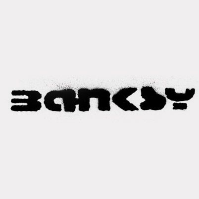 banksy in black stencil letters