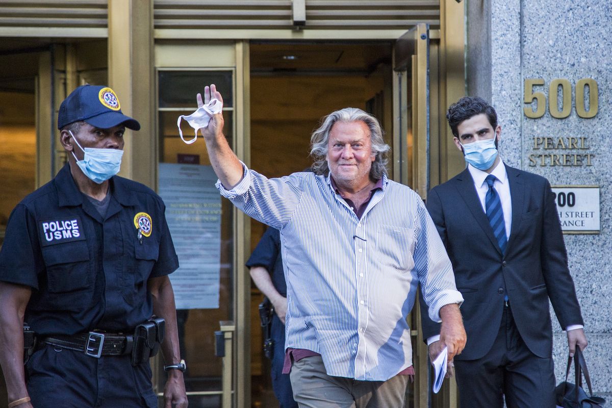 new york, ny   august 20 former white house chief strategist steve bannon waves as he exits the manhattan federal court on august 20, 2020 in the manhattan borough of new york city bannon and three other defendants have been indicted for allegedly defrauding donors in a $25 million border wall fundraising campaign photo by pablo monsalveviewpress via getty images