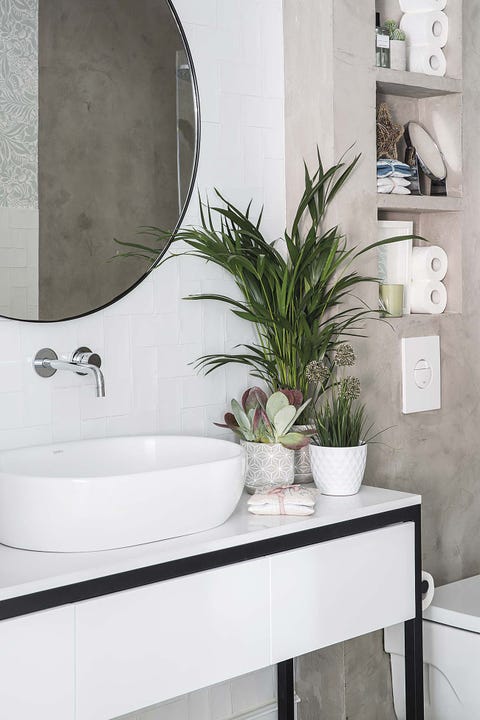 mueble de lavabo blanco con perfil en negro lavabo ovalado