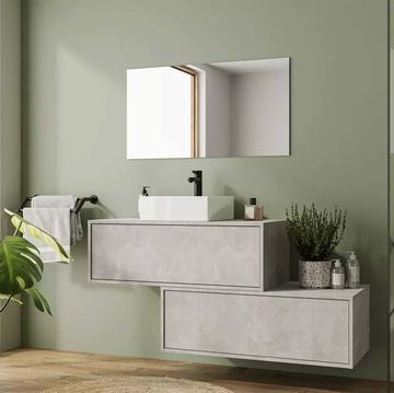 baño verde moderno con mueble de lavabo gris