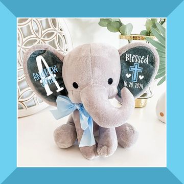 personalized baptism plates and stuffed elephant