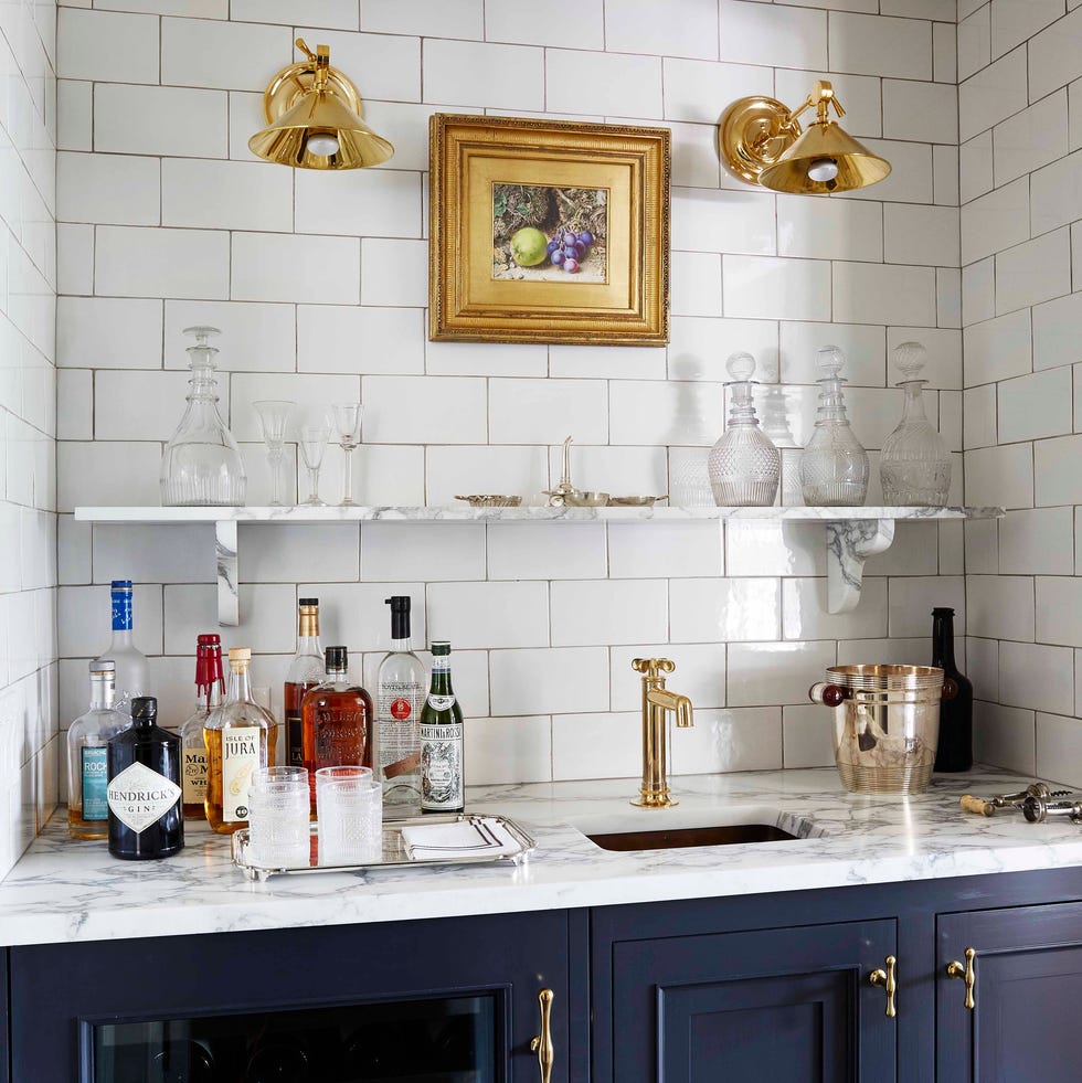barbara sallick kitchen bar with navy cabinets and white subway tile