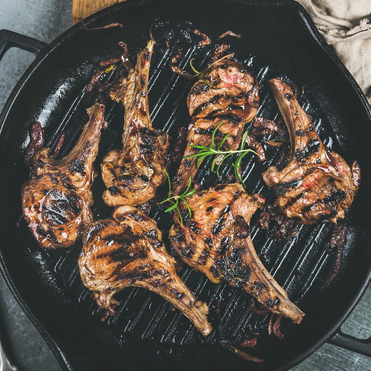 Barbecue dinner with grilled lamb meat chops in pan