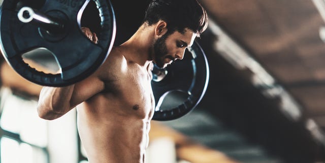 Squat exercise in a gym.