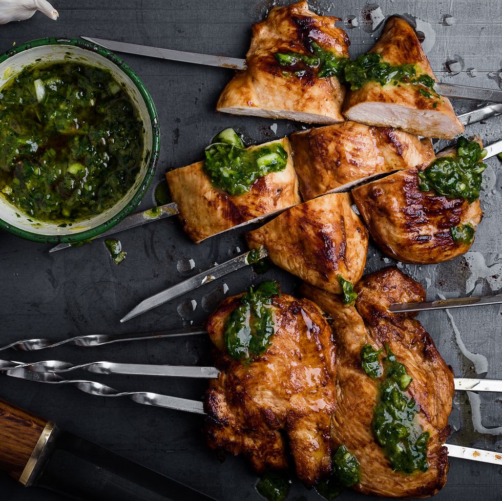 Barbequed chicken breast skewers with chimichurri sauce