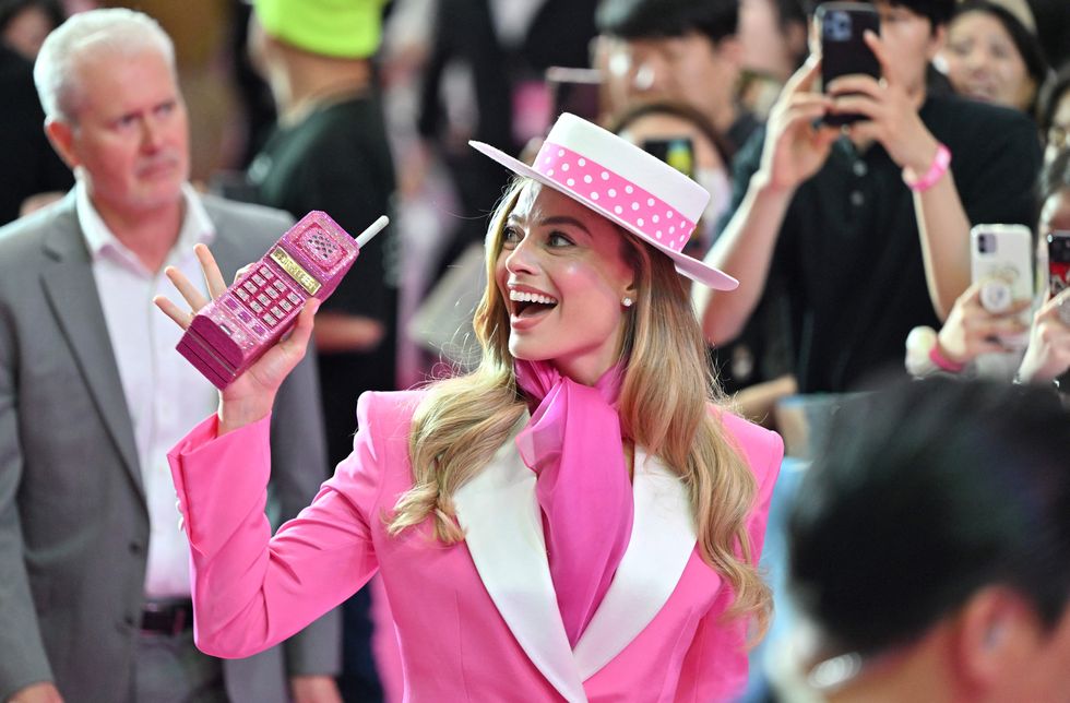 australian actress margot robbie meets fans during a pink carpet event to promote her new film barbie in seoul on july 2, 2023 photo by jung yeon je afp photo by jung yeon jeafp via getty images
