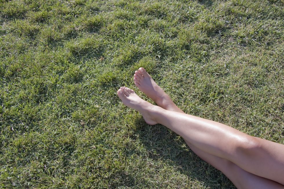 bare feet green grass