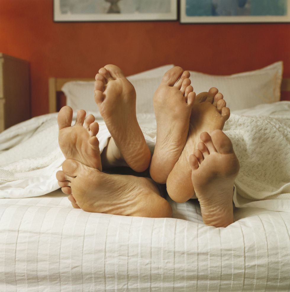 bare feet in bed
