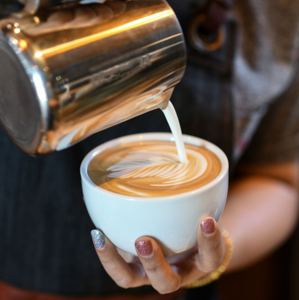 barista made coffee latte leaf shaped