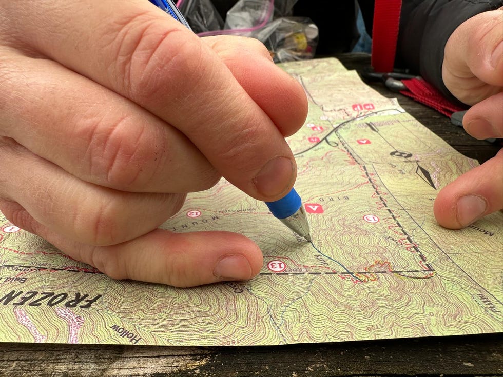 a person holding a blue object