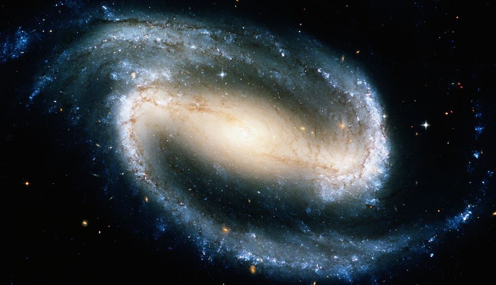 barred spiral galaxy ngc 1300, satellite view