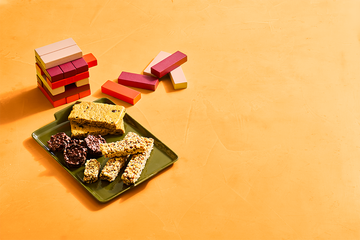 assorted bars and bites alongside a jenga set