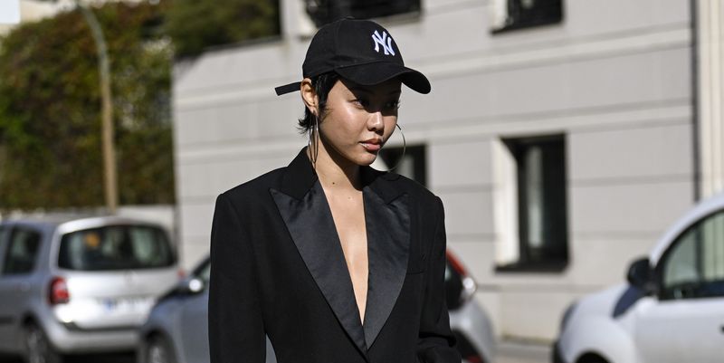 a woman wearing a baseball cap