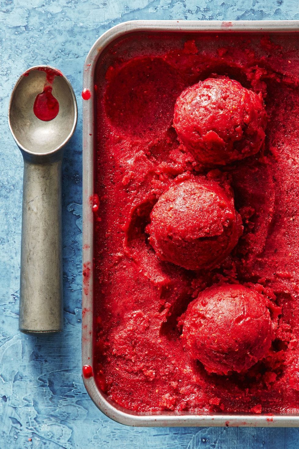 red berry sorbet in an ice cream tin