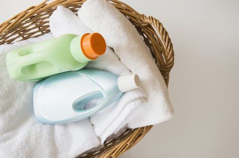 Basket with laundry and detergents