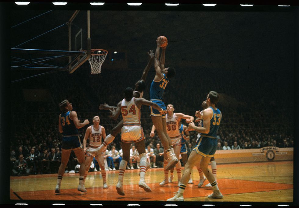 lew alcindor going up for a score