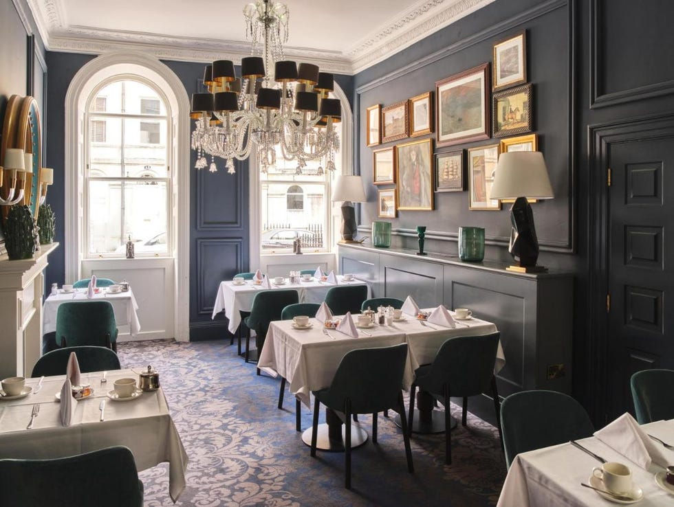 a room with tables and chairs