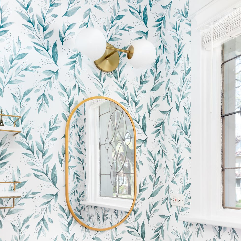 a bathroom detail with a floral pattern wallpaper.