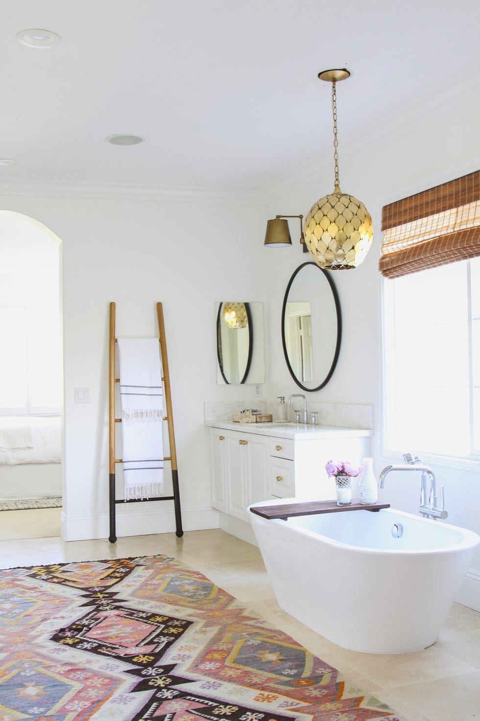 modern bathroom with ladder towel rack