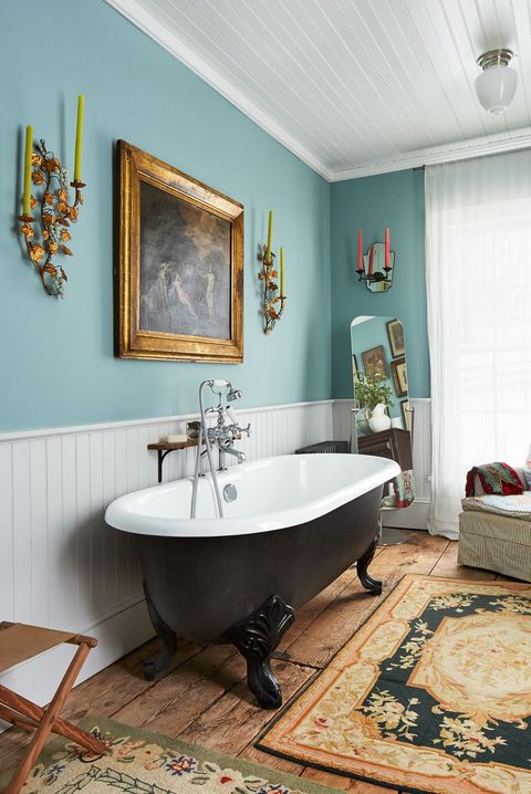 colorful eclectic bohemian bathroom with black tub