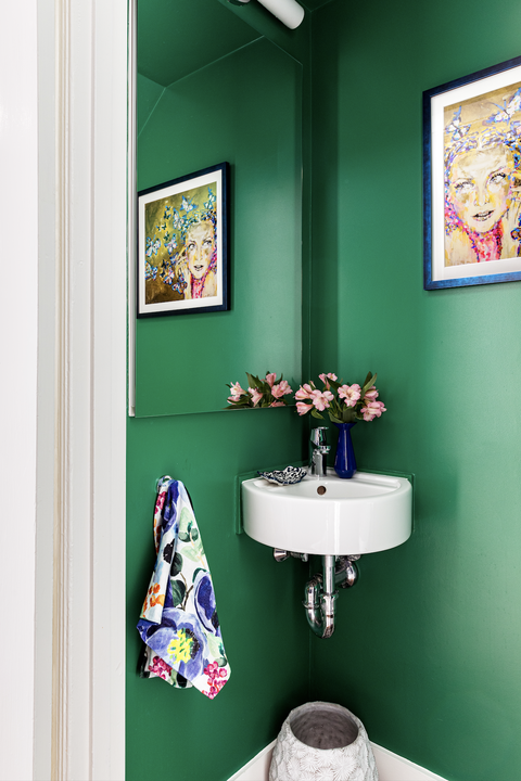 bathroom paint colors emerald colored bathroom with a colorful painting on the wall and mirror
