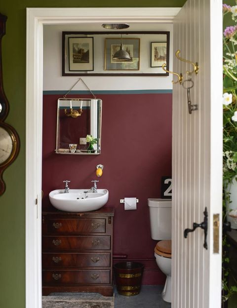 bathroom paint colors, rich red powder room with a white sink
