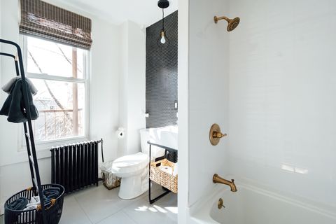 black and white bathroom with ladder