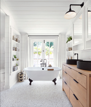 bathroom shelf ideas, large white bathroom with a white tub and shelves on both sides