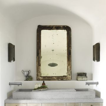 a trough sink is always a statement maker all the more so with side mounted faucets that recall garden fountains