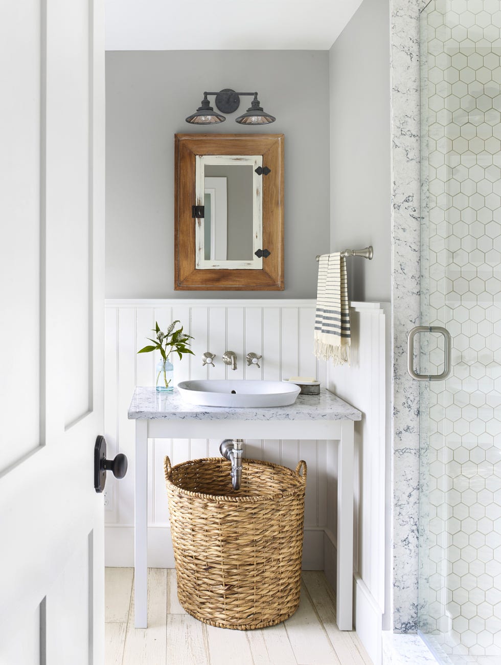 bathroom with wall mounted faucets