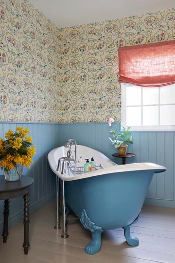 bathroom in country home with cast iron tub