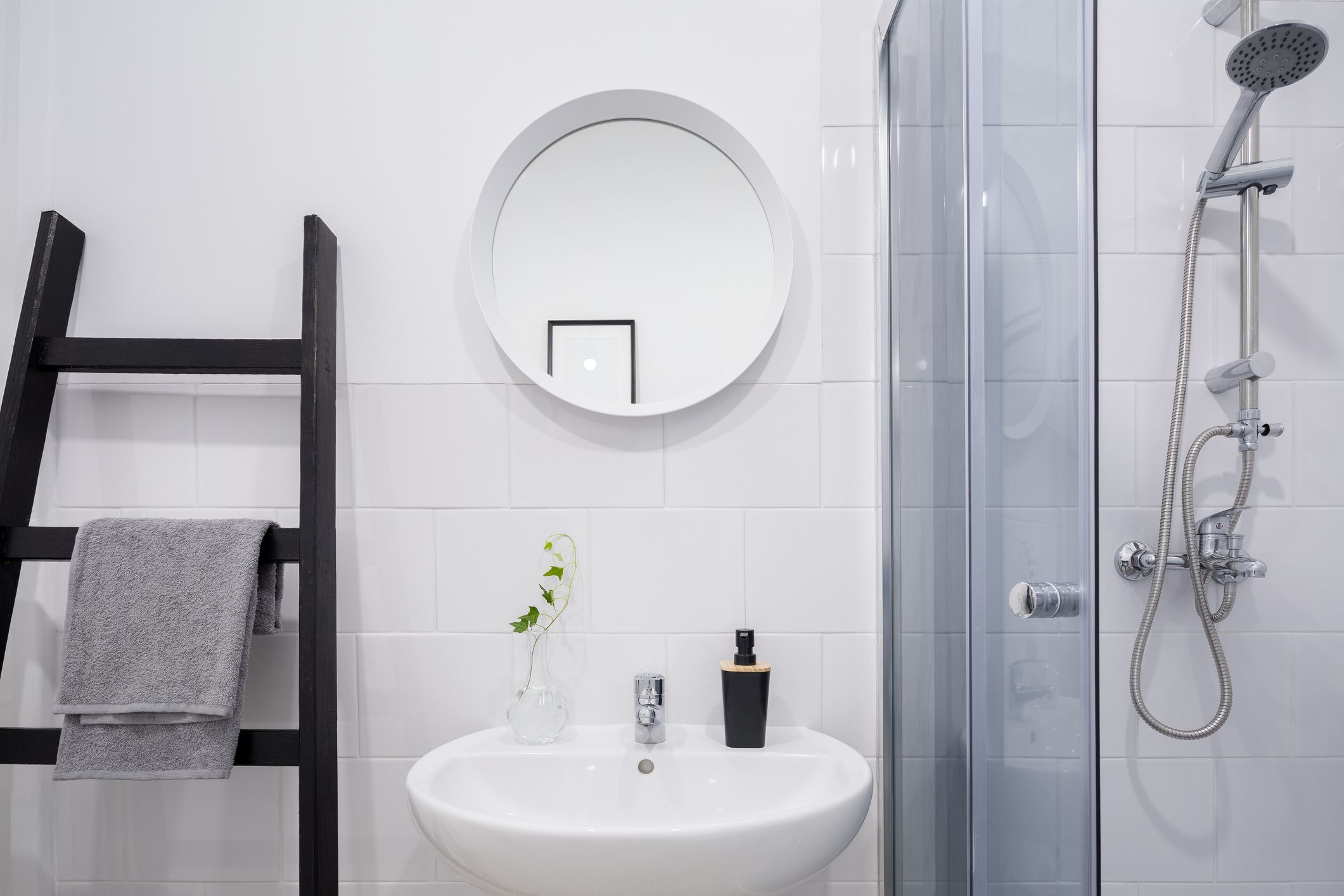 https://hips.hearstapps.com/hmg-prod/images/bathroom-with-ladder-shelf-royalty-free-image-1574390195.jpg