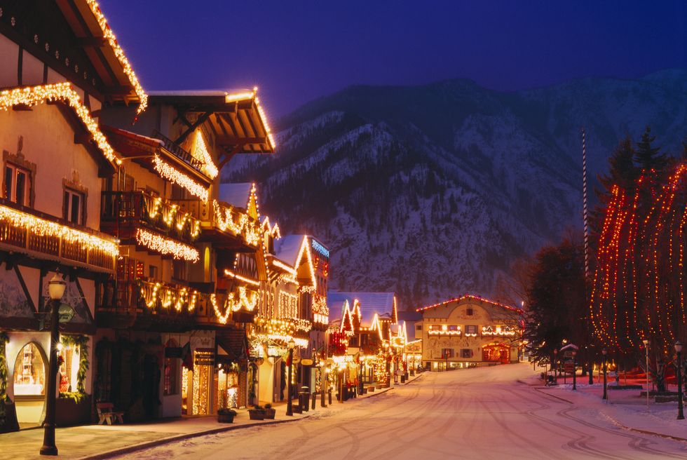 bavarian style village near cascade mountains decorated with christmas lights