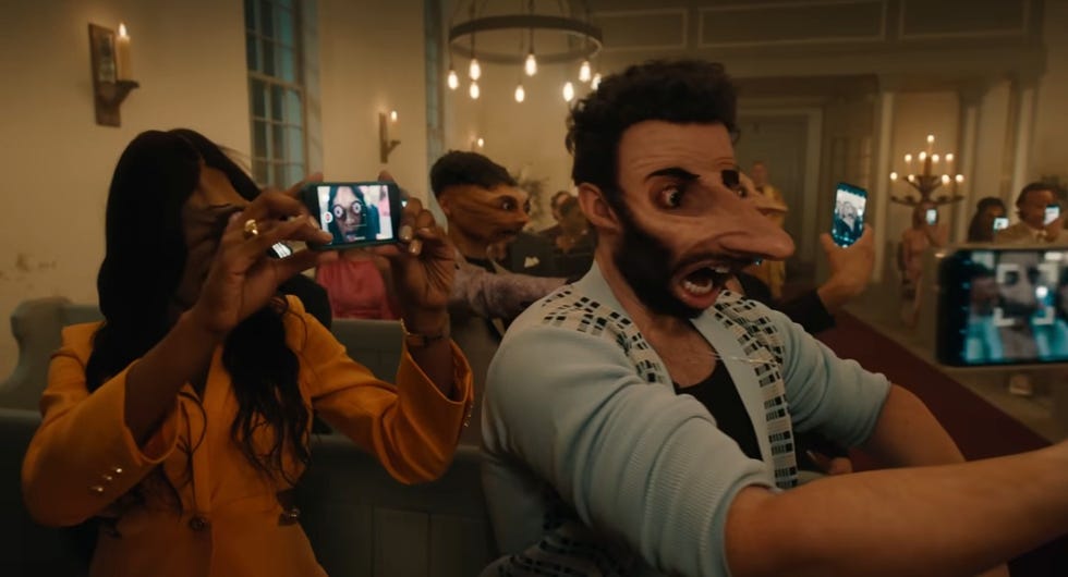influencers get their faces stretched in a scene from beetlejuice beetlejuice