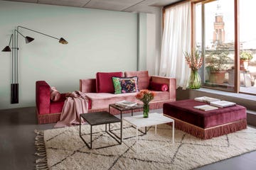Ester Bruzkus' Berlin home, the velvet sofa in three hues of pink is her own design with Studio Coucou