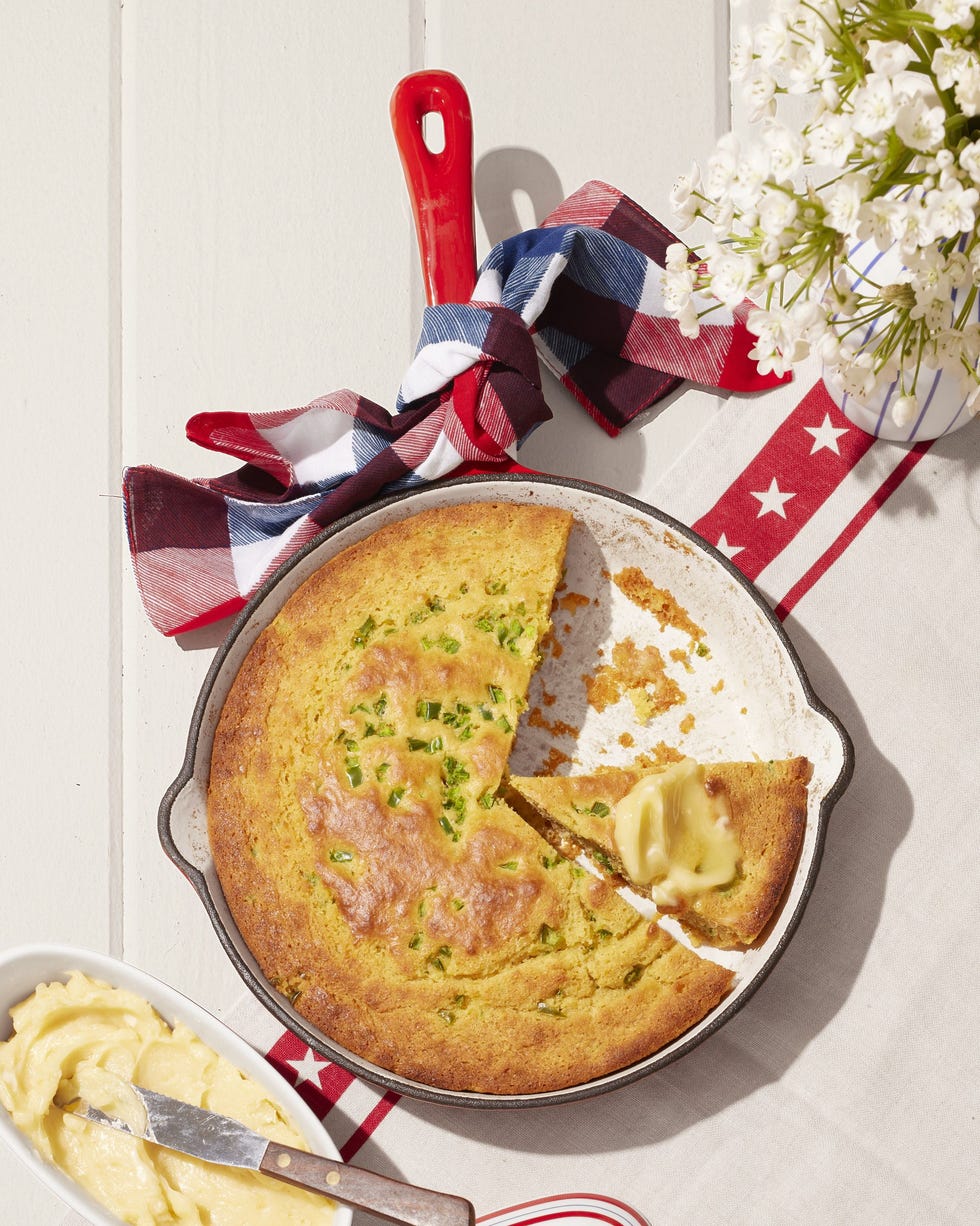 jalapeño sour cream cornbread in a red enamel cast iron stillet