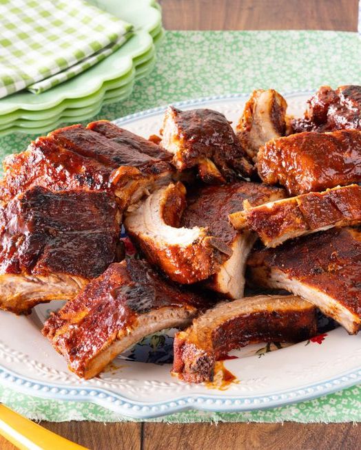 https://hips.hearstapps.com/hmg-prod/images/bbq-recipes-grilled-bbq-ribs-1646684260.jpeg?crop=0.536xw:1.00xh;0.301xw,0&resize=980:*