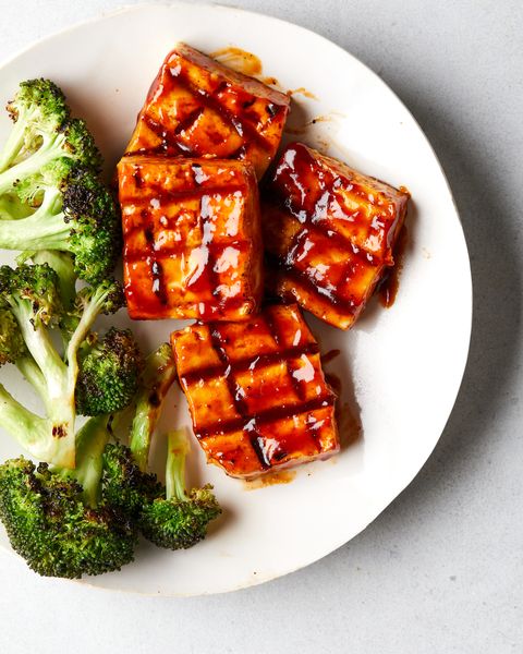 bbq tofu on a plate with roasted broccoli