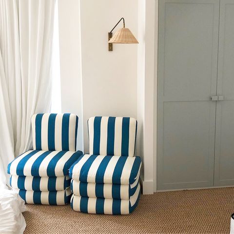 corner with contemporary blue and white striped chairs