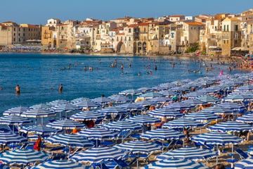 beach umbrellas, parasols, lungomare beach, cefalu, province of palermo, sicily, italy, mediterranean, europe