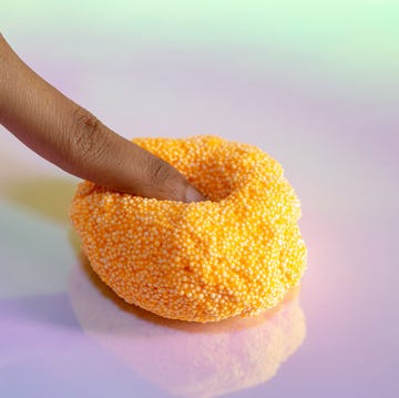 Beads slime with human hand