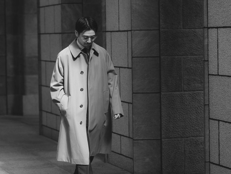 a man in a trench coat