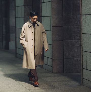 a man wearing a trench coat