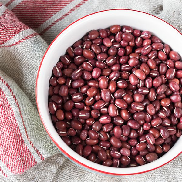 Directly Above Shot Of Adzuki Beans In Bowl On Napkin