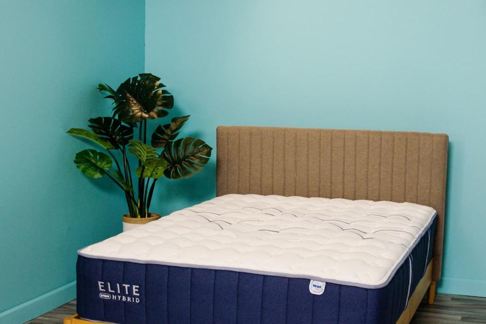 a bear elite hybrid mattress on a bed frame at good housekeeping