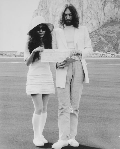 John Lennon and Yoko Ono Holding Marriage Certificate