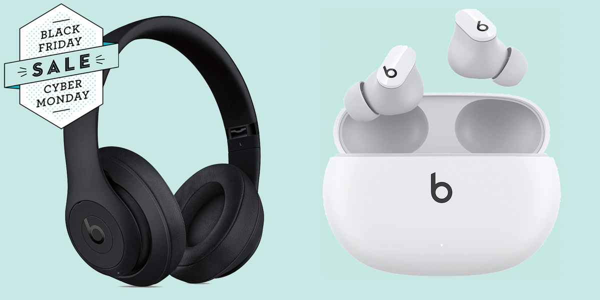 black beats headphones and white beats earbuds, pictured side by side