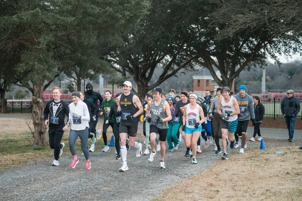 participants in a running event on a gravel path