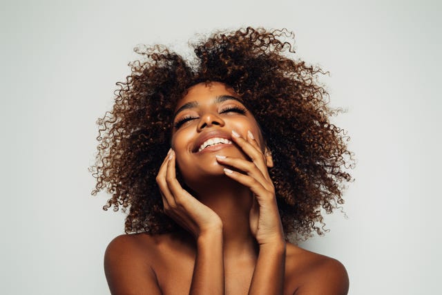 beautiful afro girl with curly hairstyle